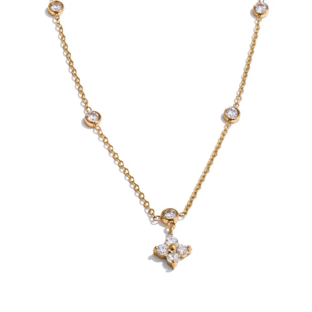 Minimal Me Essentials gold-tone necklace with bezel-set zirconia stones and a four-stone pendant