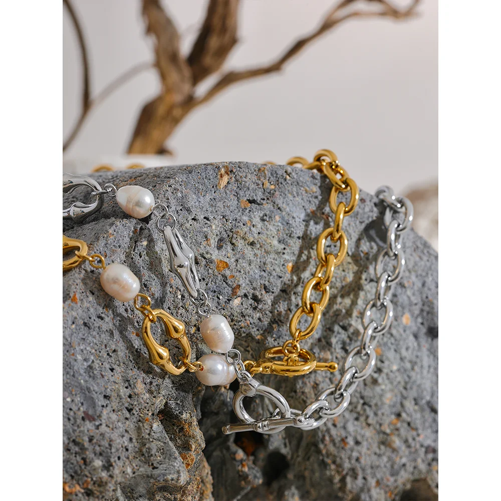 Statement Pieces jewelry: gold and silver chain bracelets with pearls on a textured rock.