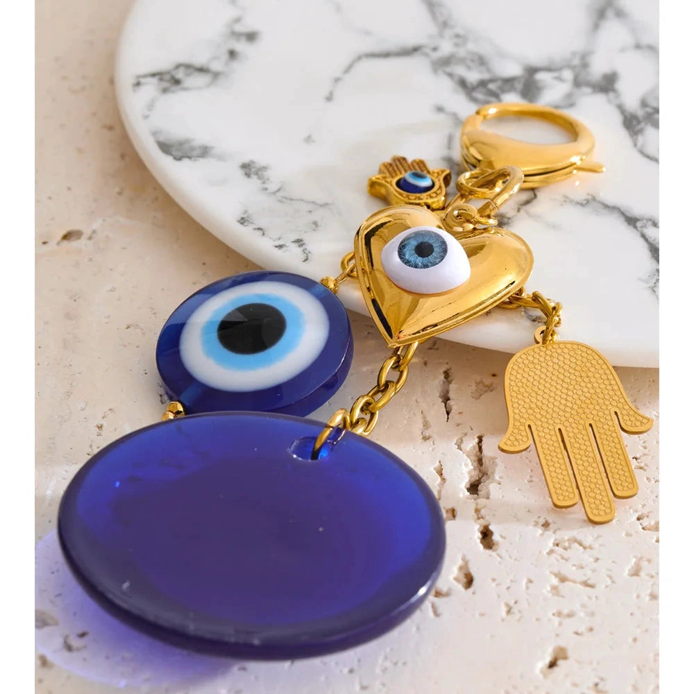 Stylish Unique Blue Resin Round Eye Palm Chain Pendant keychain 18K Golden Plated Stainless Steel Decoration Jewelry by PoisedMe